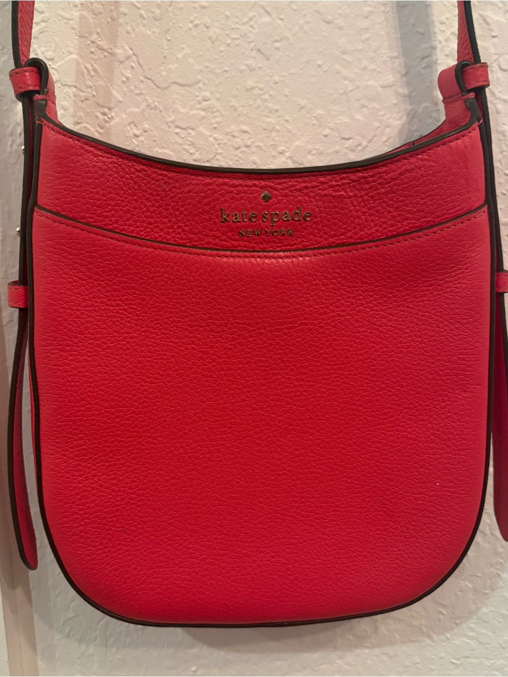 kate spade red pebbled leather crossbody with gold logo